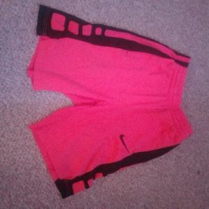 Neon pink Nike elite shorts